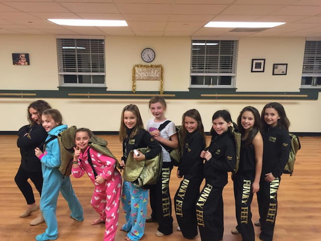 a group of people posing for a photo