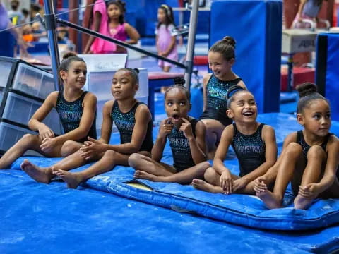 a group of children in a pool