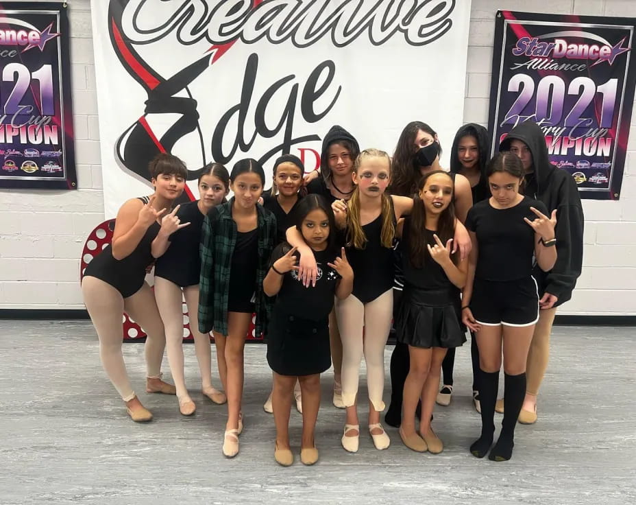 a group of women posing for a photo