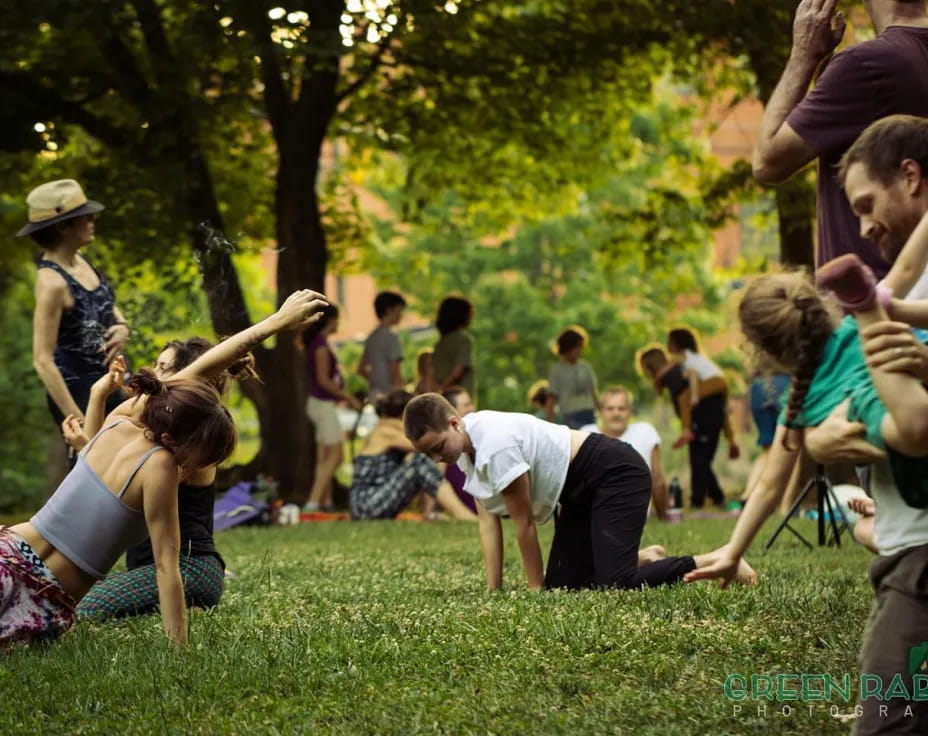 a group of people doing yoga