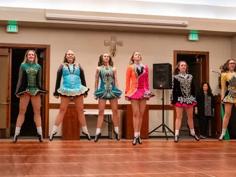 a group of women on a stage