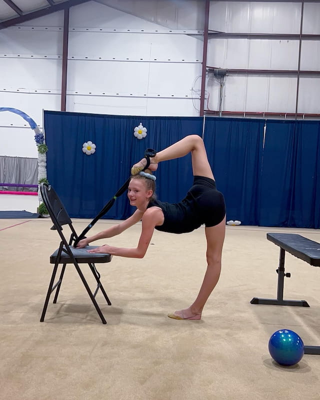 a person holding a ball