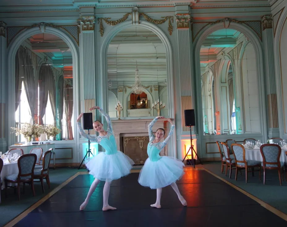 two women dancing in a room