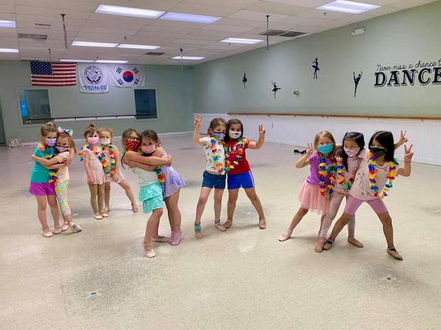 a group of children dancing