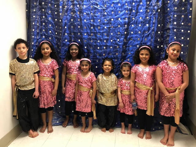 a group of children posing for a photo