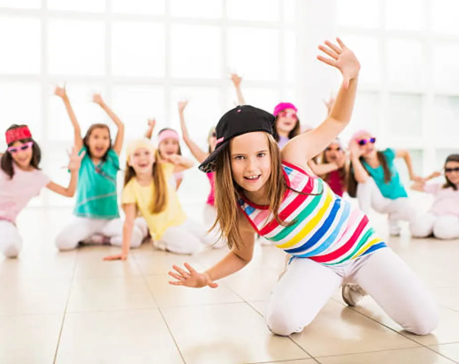 a group of girls in a room