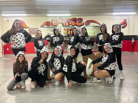 a group of women wearing clothing