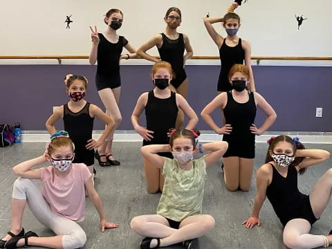 a group of people wearing masks