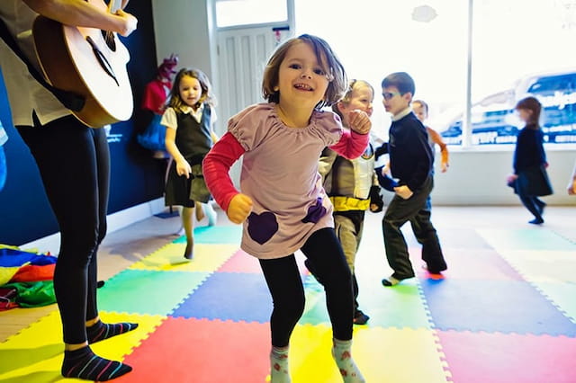 a group of children dancing