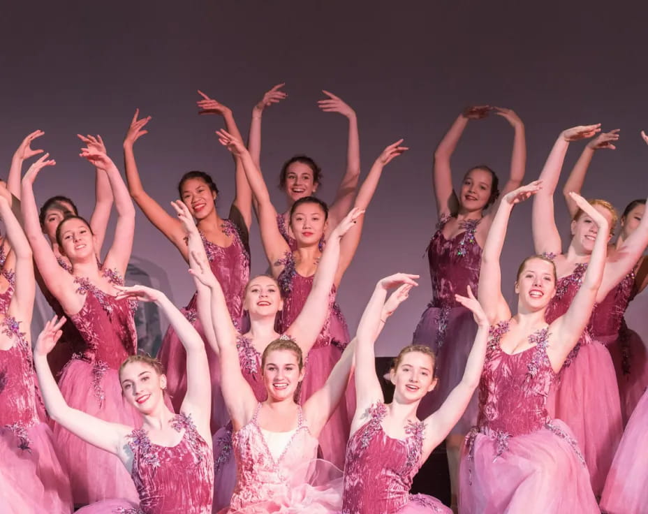 a group of women in dresses