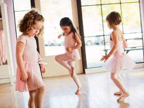 a group of girls dancing