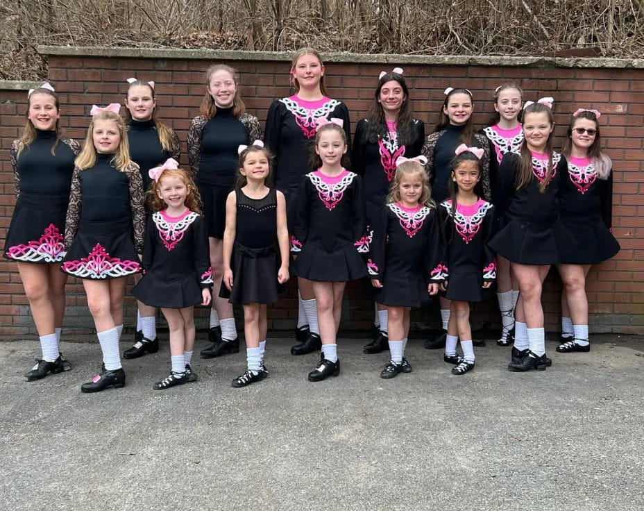 a group of girls in school uniforms