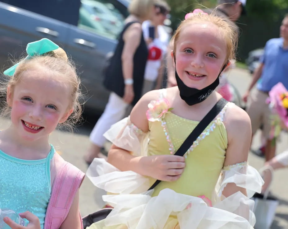 a couple of girls smiling