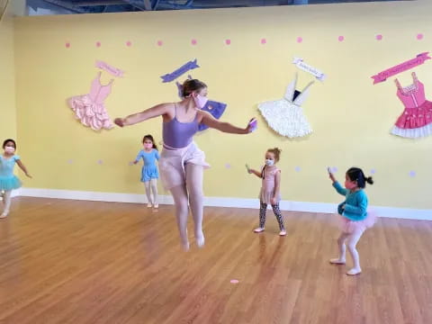 a group of children dancing