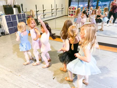 a group of children dancing