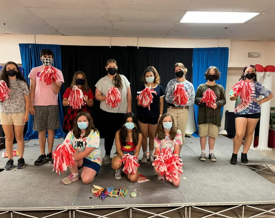 a group of people wearing masks