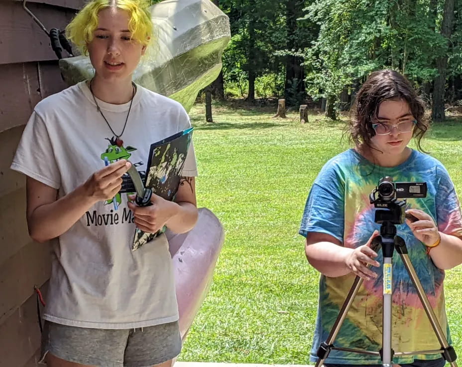 a couple of people holding guns