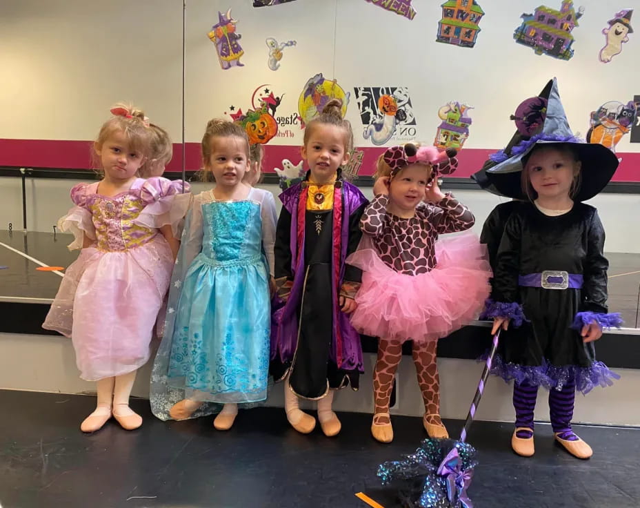 a group of children in clothing