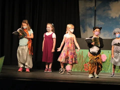 a group of children on a stage