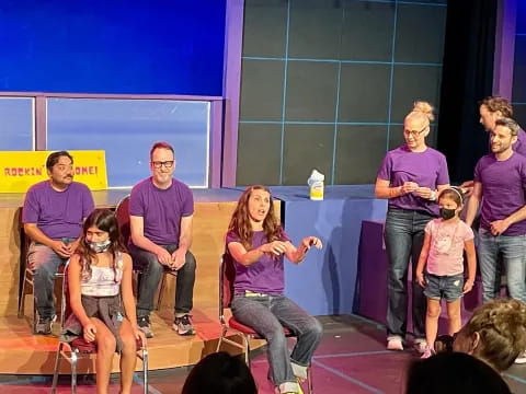 a group of people on a stage