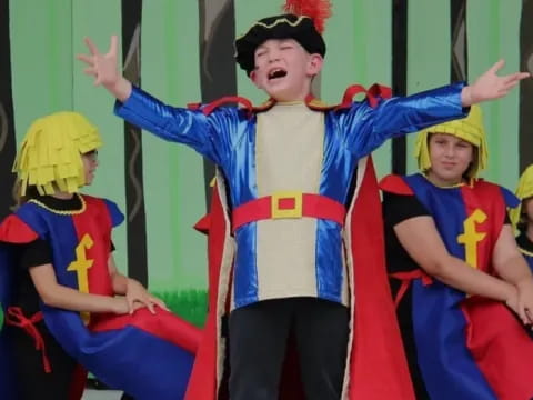 a group of children in clothing