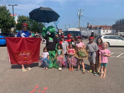 a group of people holding a flag