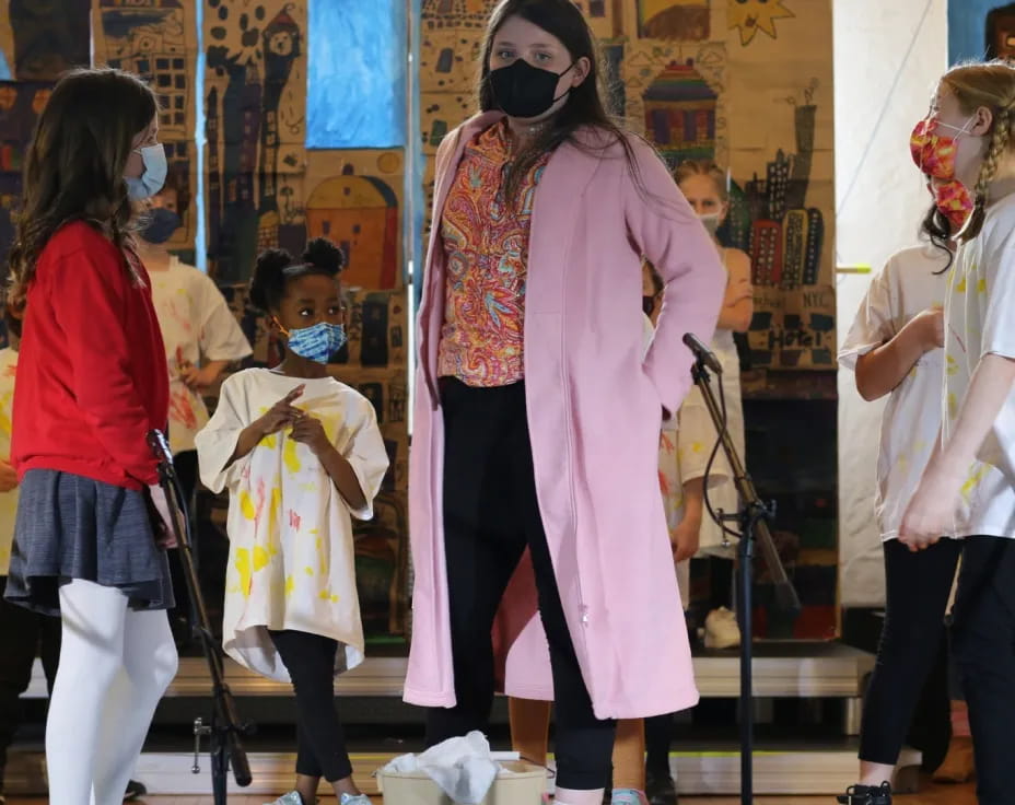 a woman in a pink dress