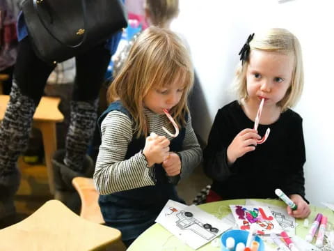 a couple of girls eating