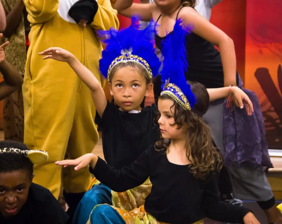 a group of children dancing
