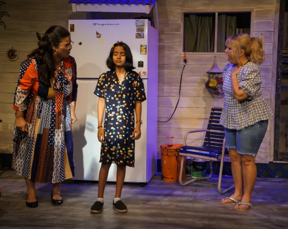 a group of women standing in a room