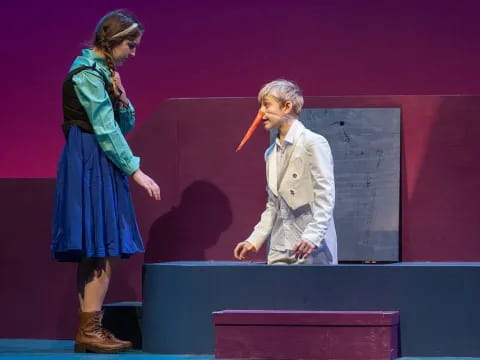 a man and a woman on a stage