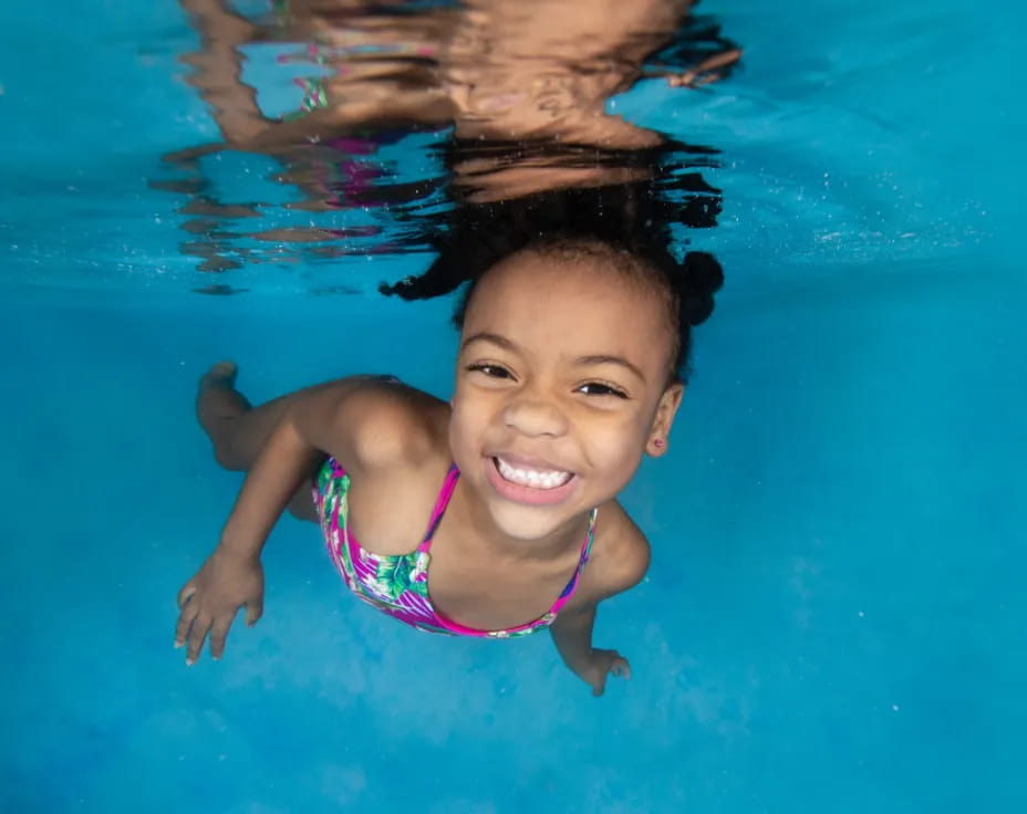 a girl in a pool