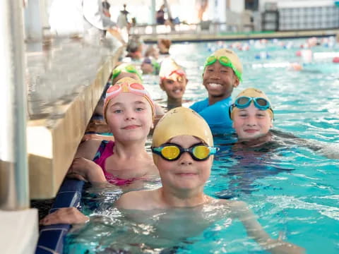 a group of people in a pool