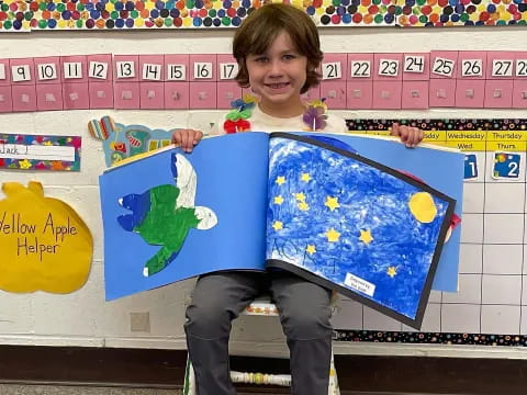 a boy holding a flag