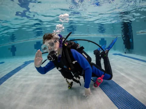 a person in scuba gear underwater