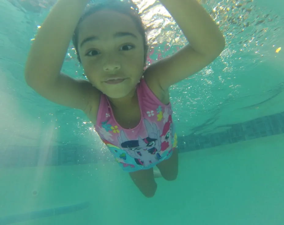 a girl in a pool