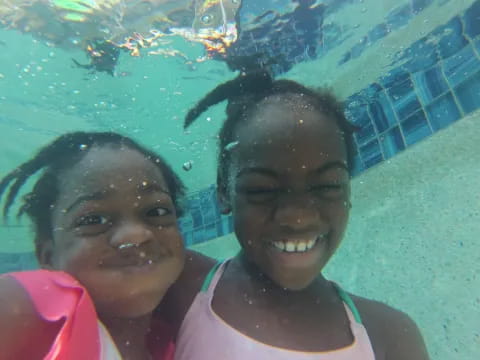 a man and a woman taking a selfie