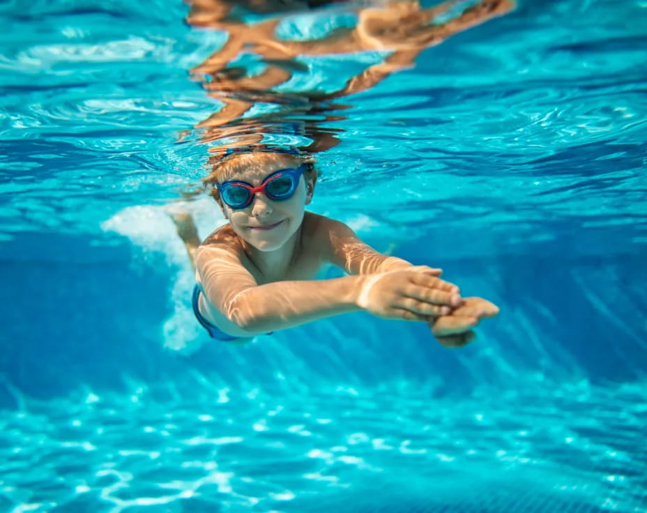 a person swimming in a pool