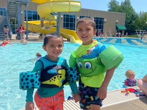 two boys in a pool