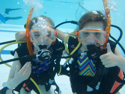 a couple of people in scuba gear