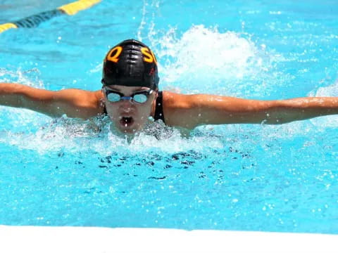 a person swimming in a pool