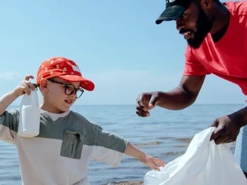 a man and a boy holding hands