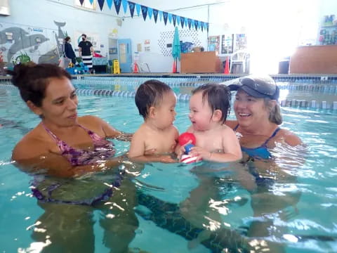 a group of people in a pool