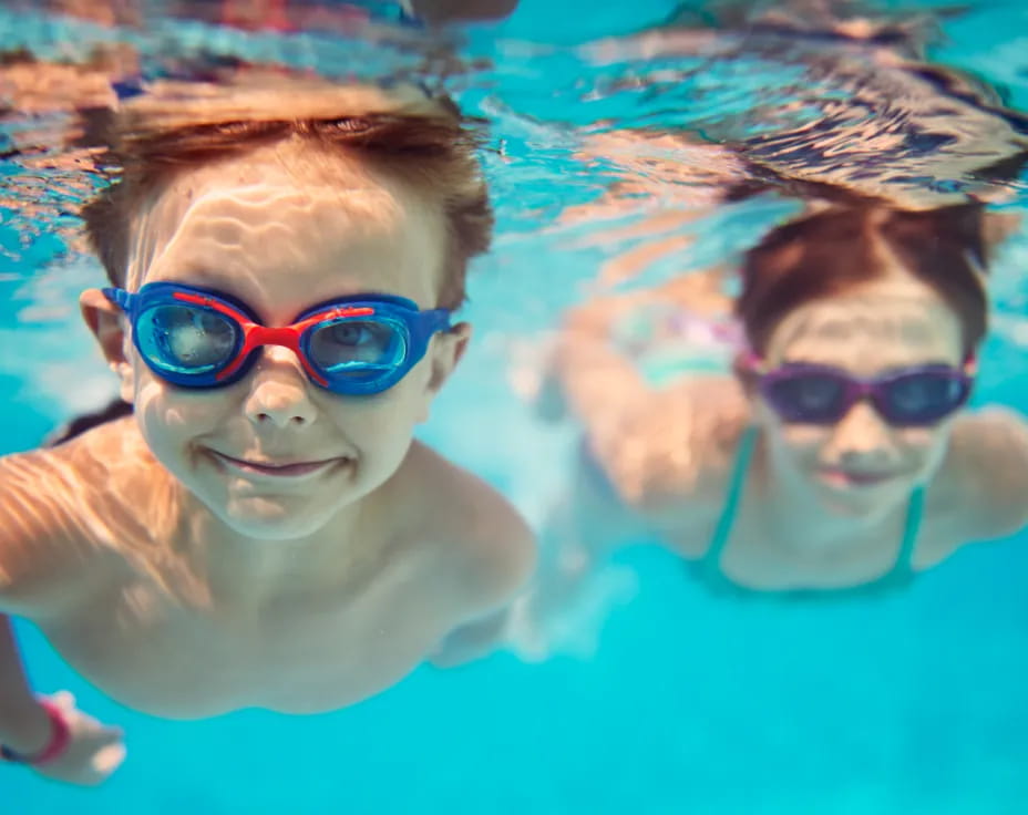 a man and a woman swimming