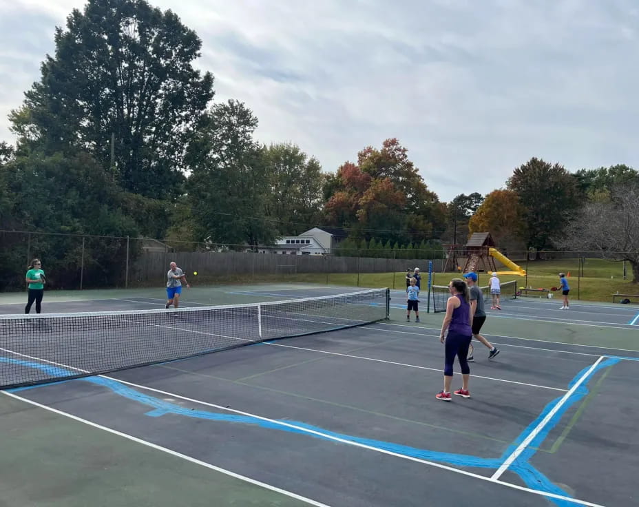 a group of people playing a sport