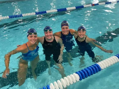 a group of people in the water