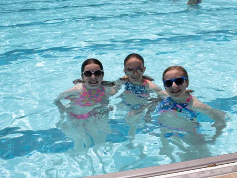 a group of people in a pool
