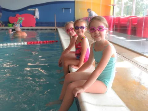 a group of people in a pool