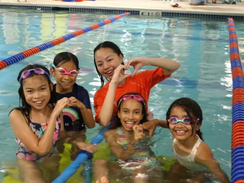 a group of people in a pool