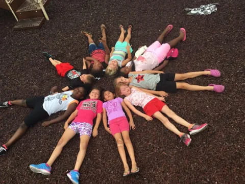 a group of girls posing for a photo